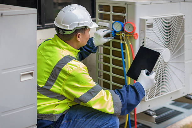 Professional Air Conditioning Repair technician working in Fords, NJ